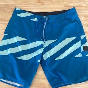 Volcom board short size 36.  Blue and light blue     In nice shape.